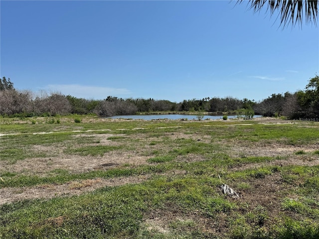3960 Headsail Dr, New Port Richey, FL 34652 - view of yard with a water view