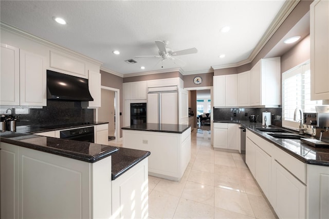 kitchen with white cabinetry, a center island, black appliances, and sink