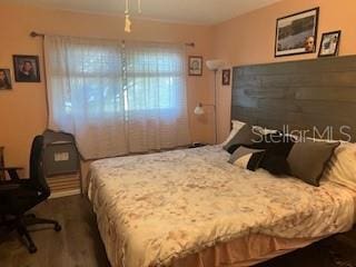 bedroom featuring hardwood / wood-style floors