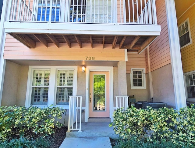 doorway to property featuring a balcony