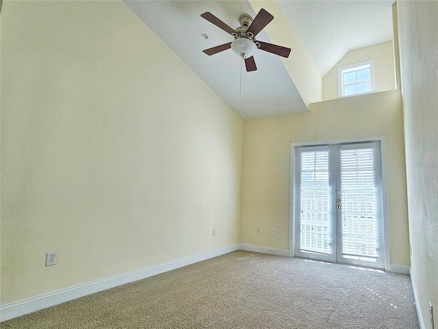 unfurnished room with carpet floors, a wealth of natural light, and ceiling fan