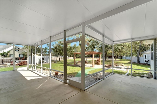 unfurnished sunroom featuring plenty of natural light