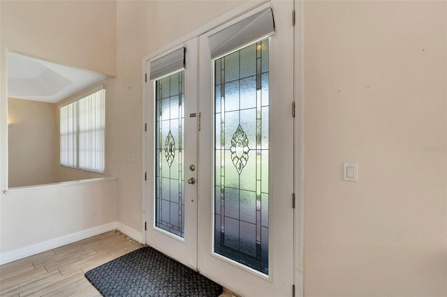 11305 Sweet Bay Ct, Riverview, FL 33569 - doorway featuring wood finished floors and baseboards
