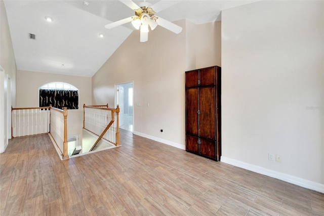 11305 Sweet Bay Ct, Riverview, FL 33569 - unfurnished room featuring high vaulted ceiling, light wood-style floors, baseboards, a ceiling fan, and recessed lighting