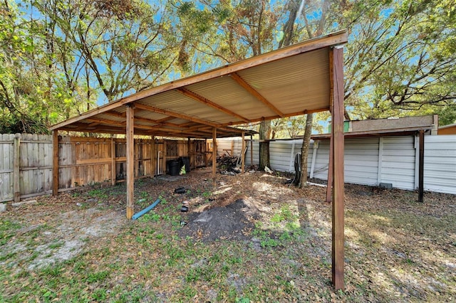 11305 Sweet Bay Ct, Riverview, FL 33569 - view of parking with a detached carport