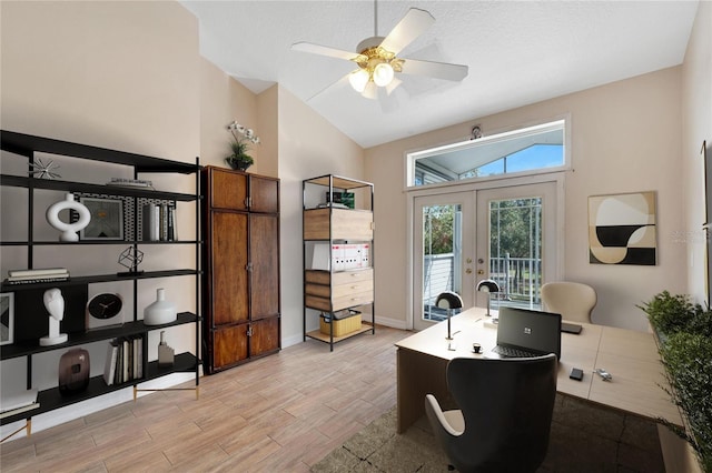 office space featuring ceiling fan, french doors, and lofted ceiling