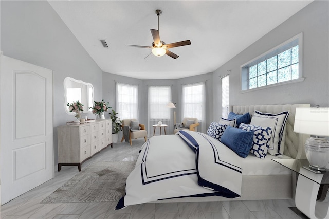 bedroom with ceiling fan and vaulted ceiling