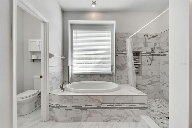 bathroom with shower with separate bathtub, toilet, and a wealth of natural light