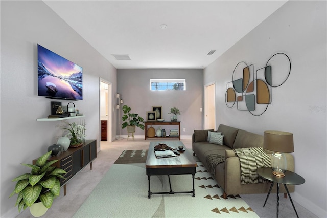 living room featuring light colored carpet