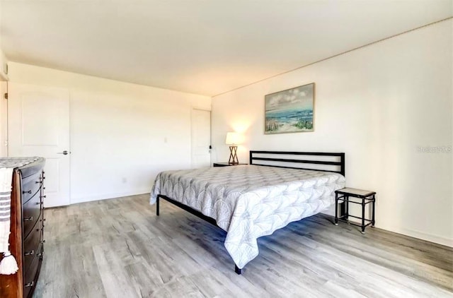 bedroom featuring light hardwood / wood-style floors