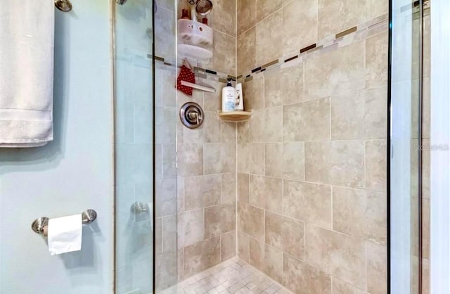 bathroom featuring an enclosed shower