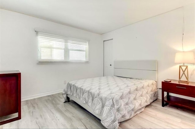 bedroom with light wood-type flooring