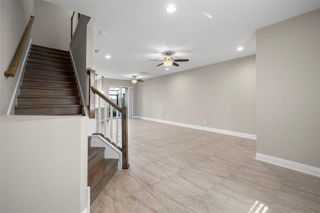 interior space with baseboards, stairway, ceiling fan, and recessed lighting