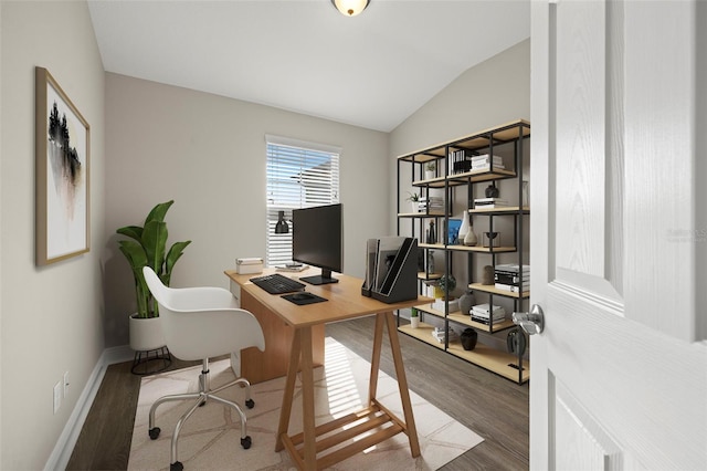 office space with dark hardwood / wood-style flooring and lofted ceiling