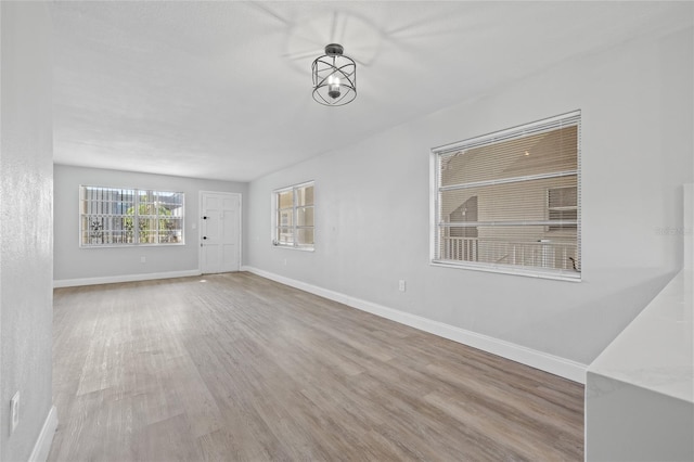 interior space with hardwood / wood-style floors