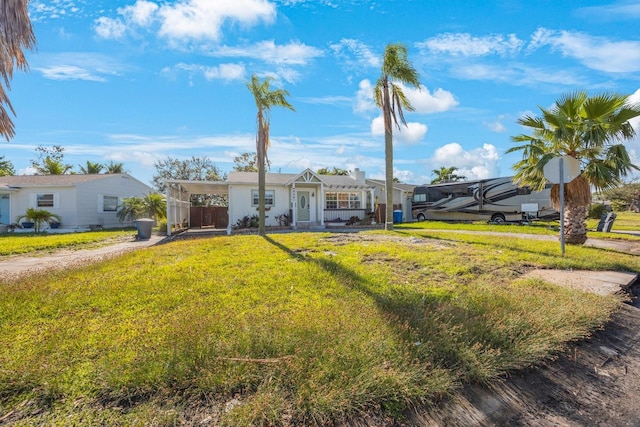 view of front of home with a front lawn