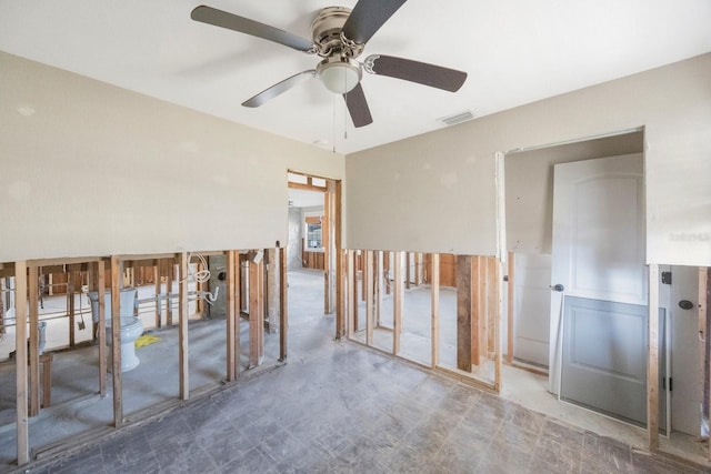 unfurnished room with ceiling fan