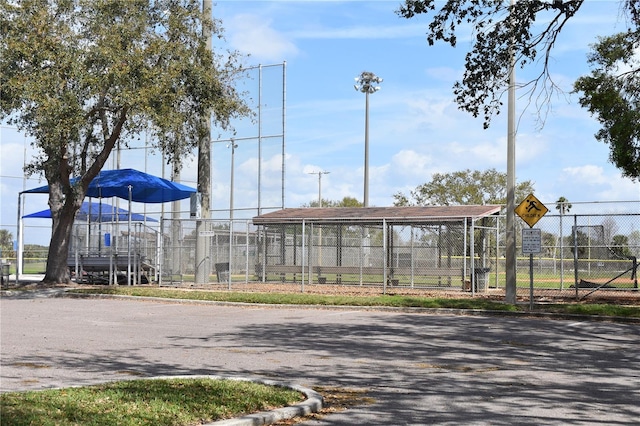 view of community with fence