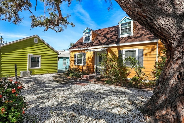 view of front of house featuring ac unit