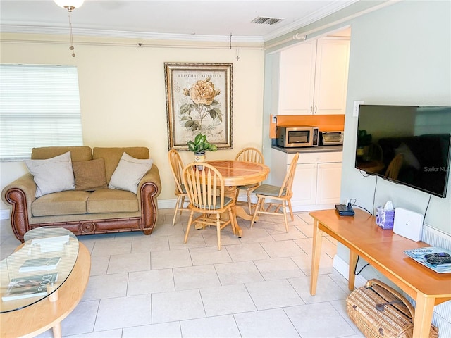 tiled living room with ornamental molding