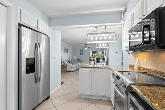 kitchen with white cabinetry, stainless steel appliances, tasteful backsplash, kitchen peninsula, and ceiling fan