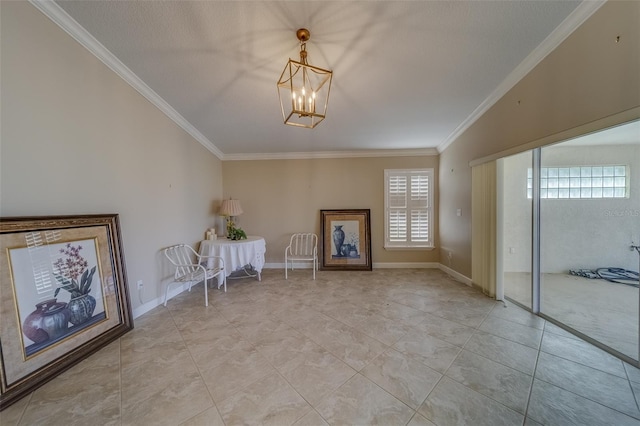 interior space with ornamental molding and an inviting chandelier