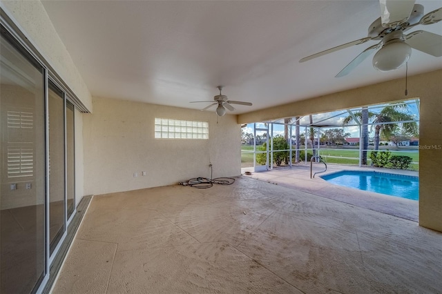 view of pool featuring ceiling fan