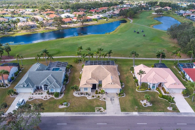 drone / aerial view with a water view