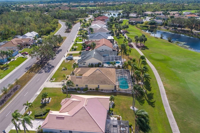 bird's eye view with a water view