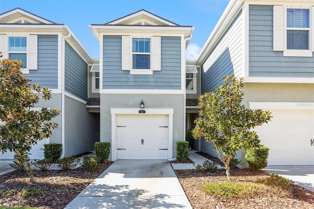 view of front of property with a garage