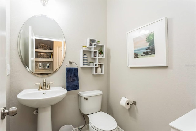 bathroom featuring toilet