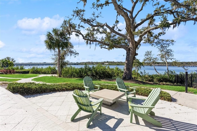 view of patio / terrace featuring a water view