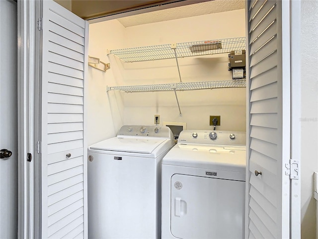 laundry area featuring separate washer and dryer