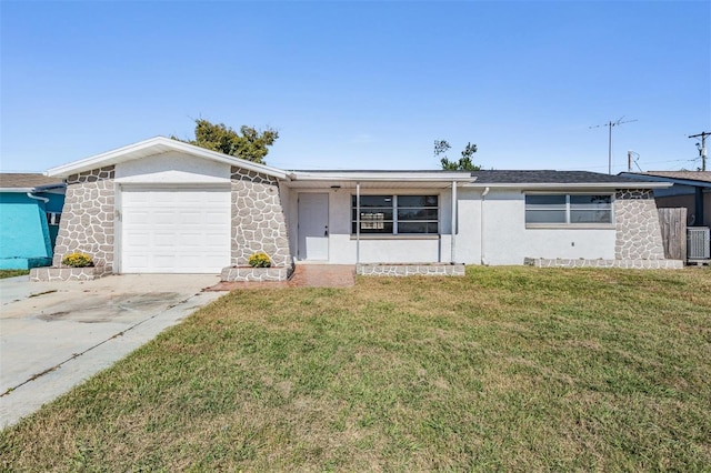 ranch-style house with cooling unit, a front lawn, and a garage