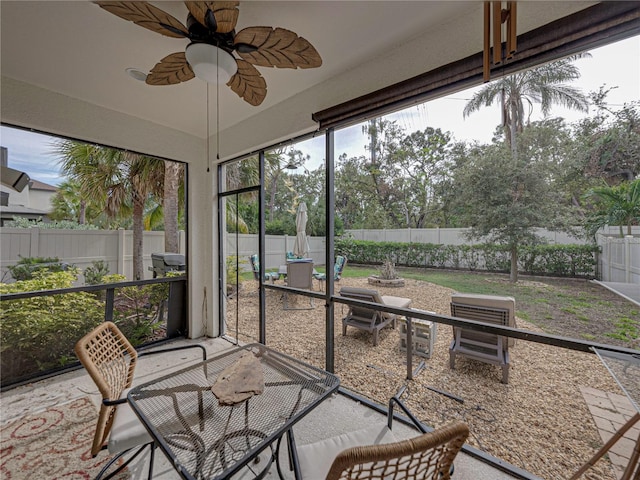 sunroom / solarium with ceiling fan