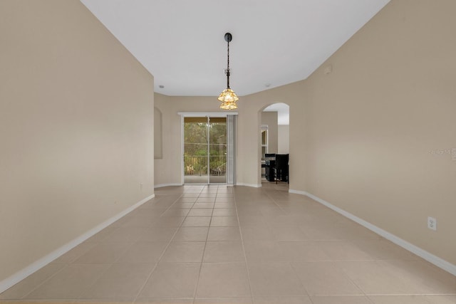 unfurnished dining area featuring light tile patterned floors