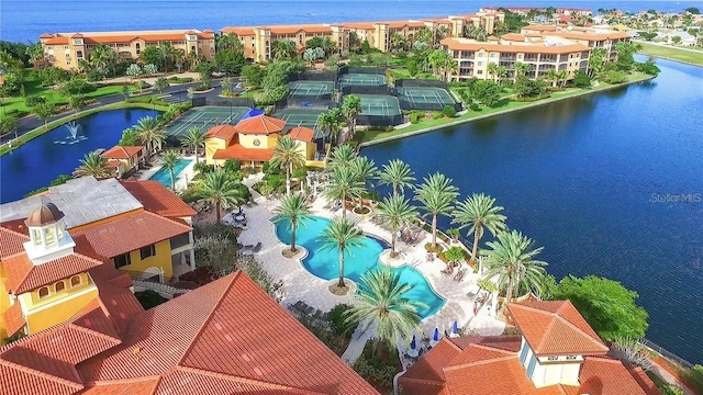 birds eye view of property featuring a water view