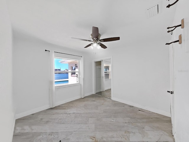 spare room featuring ceiling fan