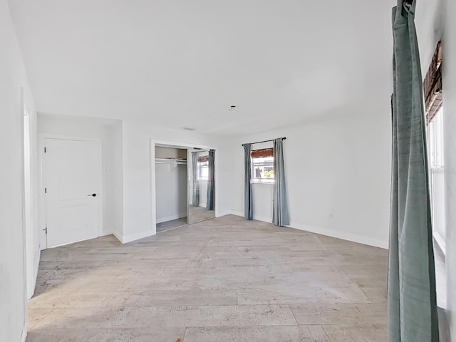 unfurnished room featuring light hardwood / wood-style floors