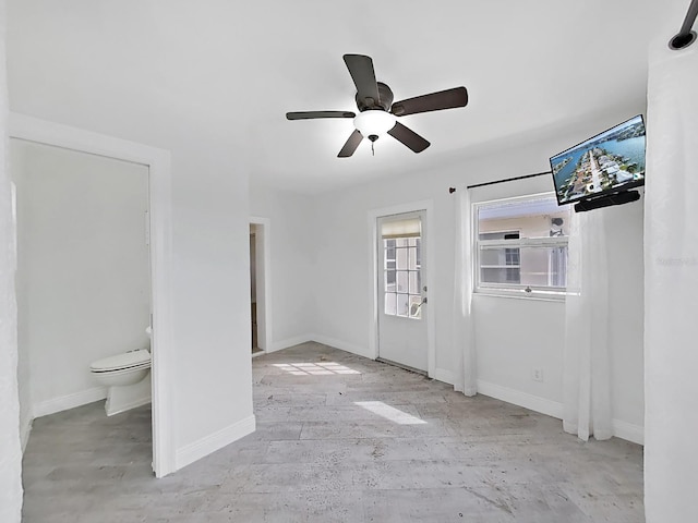 empty room featuring ceiling fan