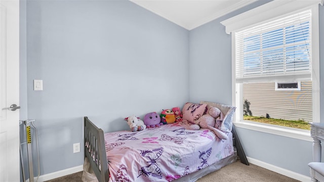 bedroom with carpet floors and ornamental molding