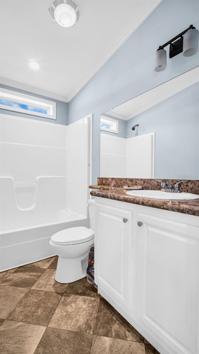 full bathroom featuring shower / tub combination, vanity, toilet, and ornamental molding