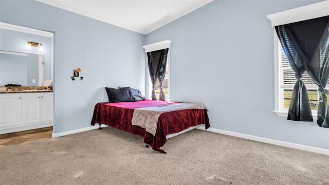 carpeted bedroom featuring connected bathroom, crown molding, vaulted ceiling, and pool table