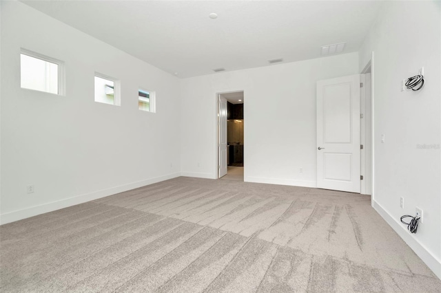 empty room with light carpet