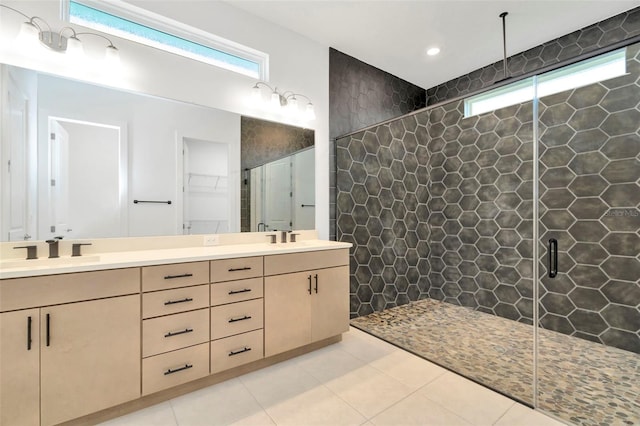 bathroom with vanity, tile patterned floors, and walk in shower