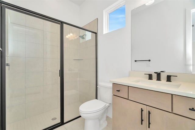 bathroom with tile patterned flooring, vanity, toilet, and an enclosed shower