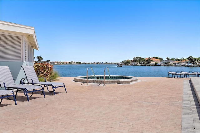 view of patio / terrace featuring a water view