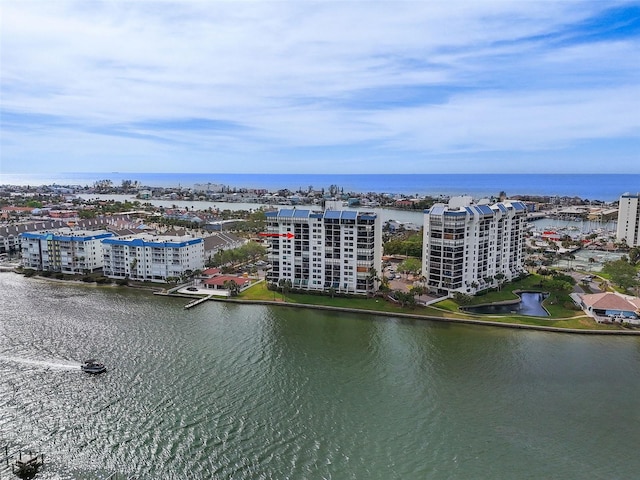 birds eye view of property featuring a water view