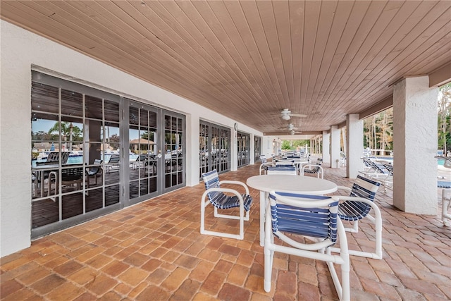 view of patio / terrace featuring french doors and ceiling fan