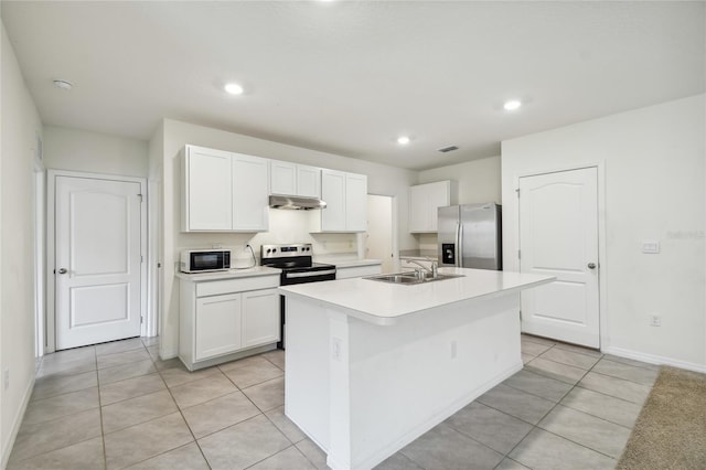 kitchen with sink, an island with sink, white cabinets, and stainless steel appliances